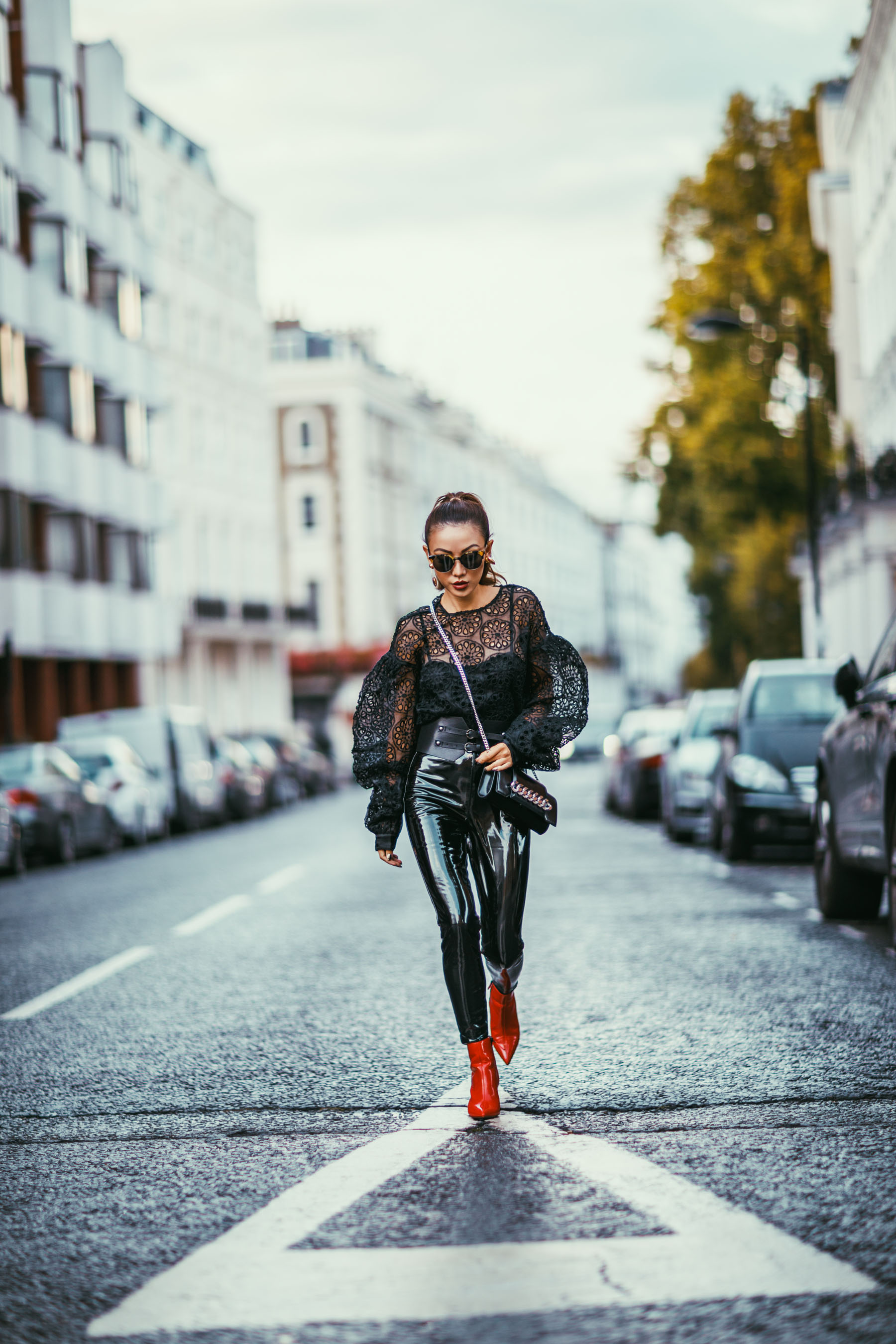 Ultimate Camera Guide for Bloggers - Shooting with a Canon 85mm 1.2 // NotJessFashion.com // Street style patent leather pants with red boots and lace top