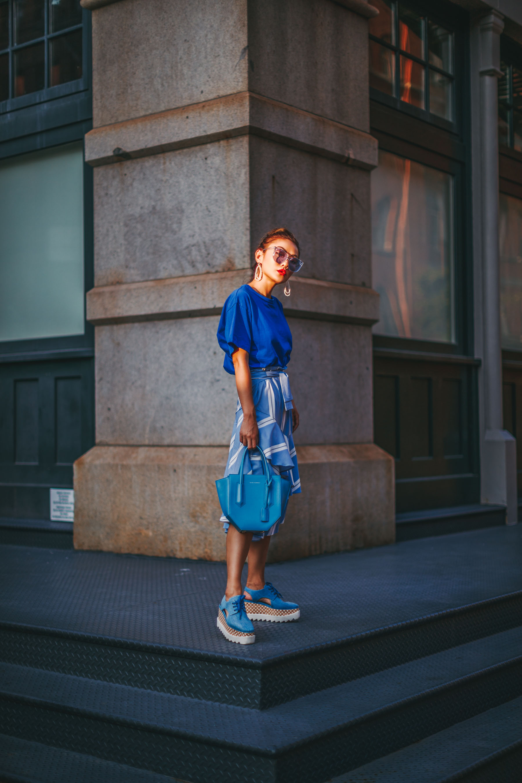 Elevate your everyday outfit with statement color mini bags - Blue Monochromatic Outfit, Edgy Style, Blue Statement Bag // NotJessFashion.com