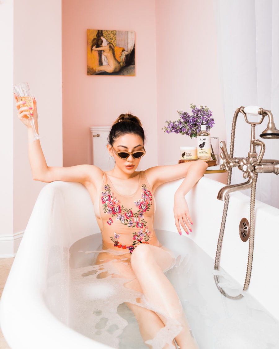 fashion blogger jessica wang sits in bathtub while sharing essential haircare tips // Jessica Wang - Notjessfashion.com