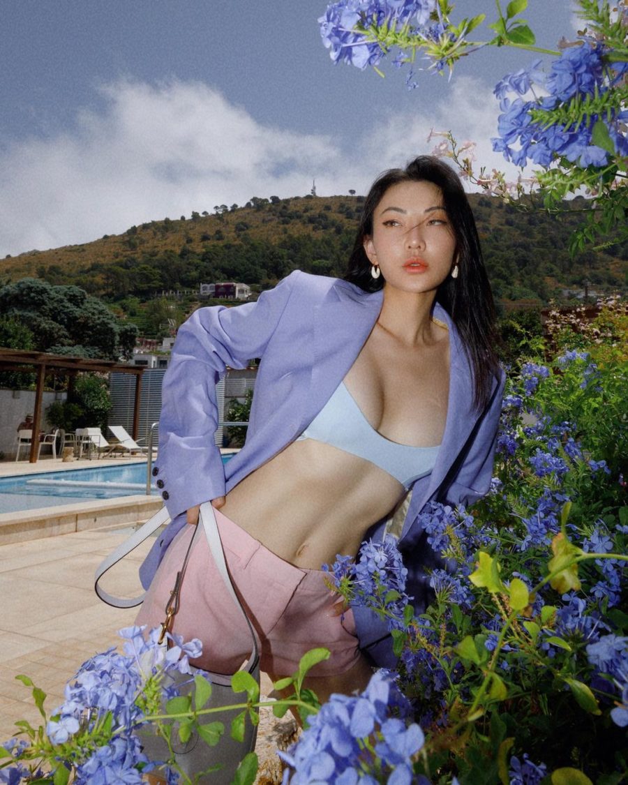 jessica wang wearing a lilac blazer, a baby blue bra top, and pastel pink shorts while sharing her dermstore anniversary sale skincare picks // Jessica Wang - Notjessfashion.com