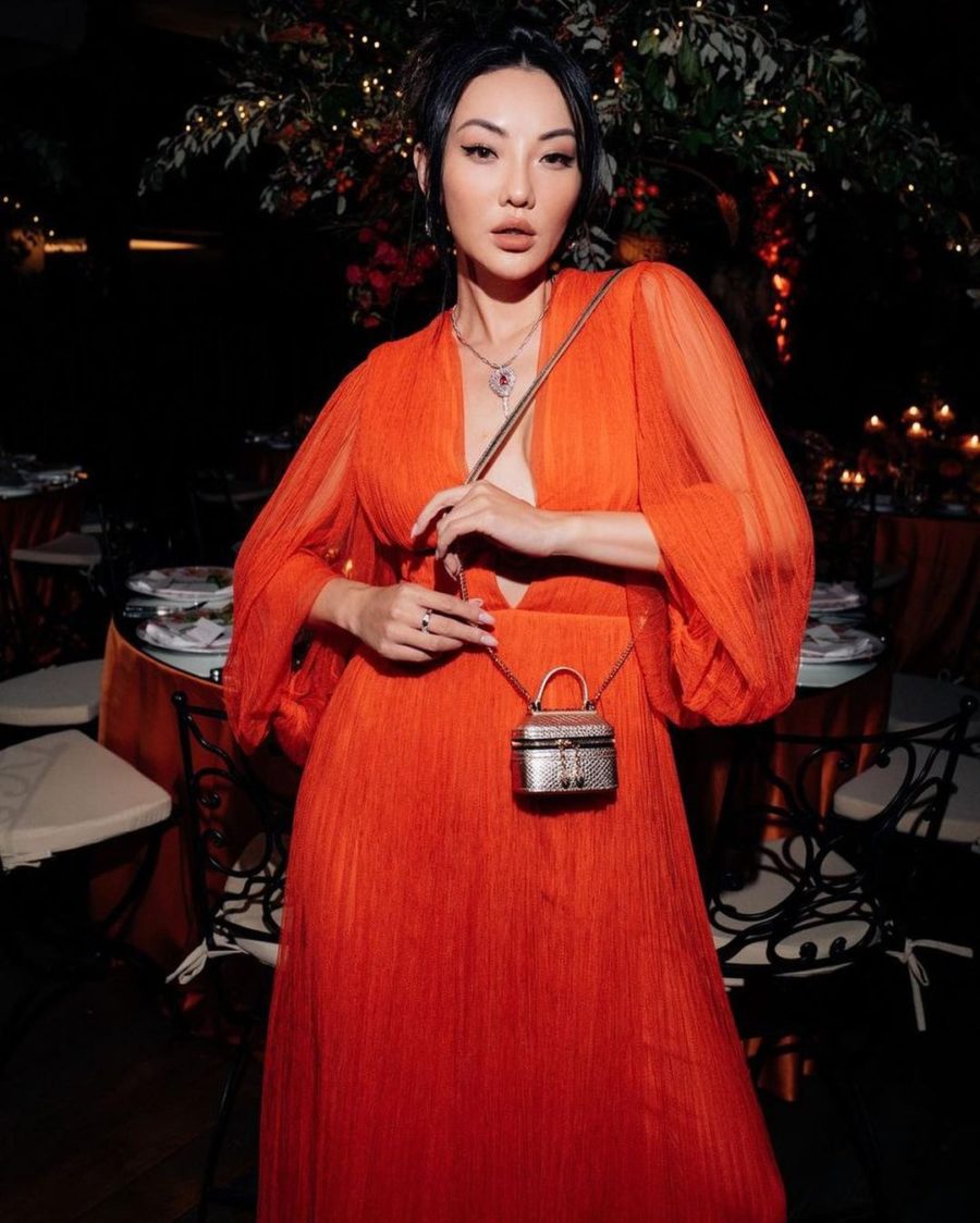 Jessica Wang wearing an orange chiffon maxi dress with a keyhole cut out and a bvlgari necklace with a petite crossbody bag // Jessica Wang - Notjessfashion.com
