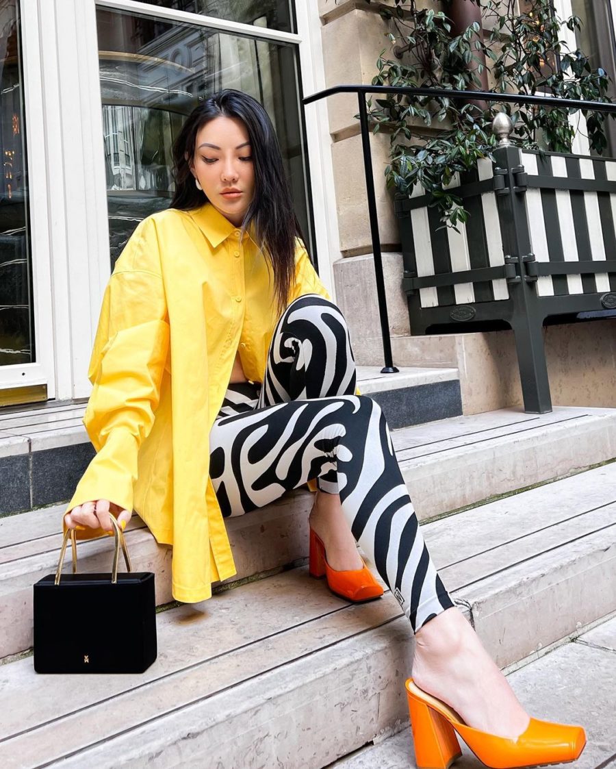 Jessica Wang wearing chic wardrobe staples featuring a yellow button up shirt with printed tights // Jessica Wang - Notjessfashion.com
